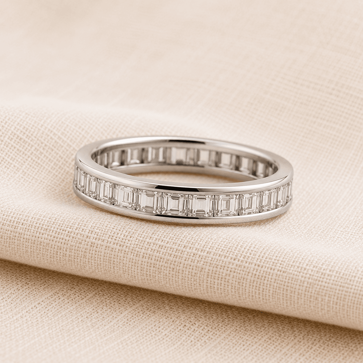 Channel-set baguette eternity wedding band in platinum at ATL Luxury Jewelers Atlanta