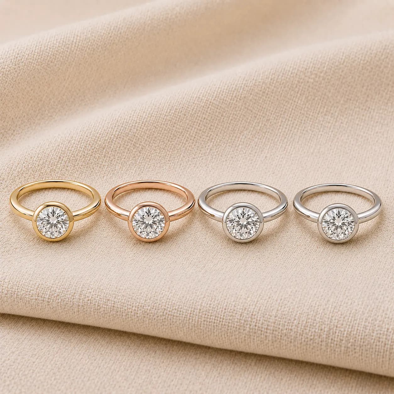 Bezel engagement rings in white gold, yellow gold, rose gold, and platinum at ATL Luxury Jewelry Atlanta