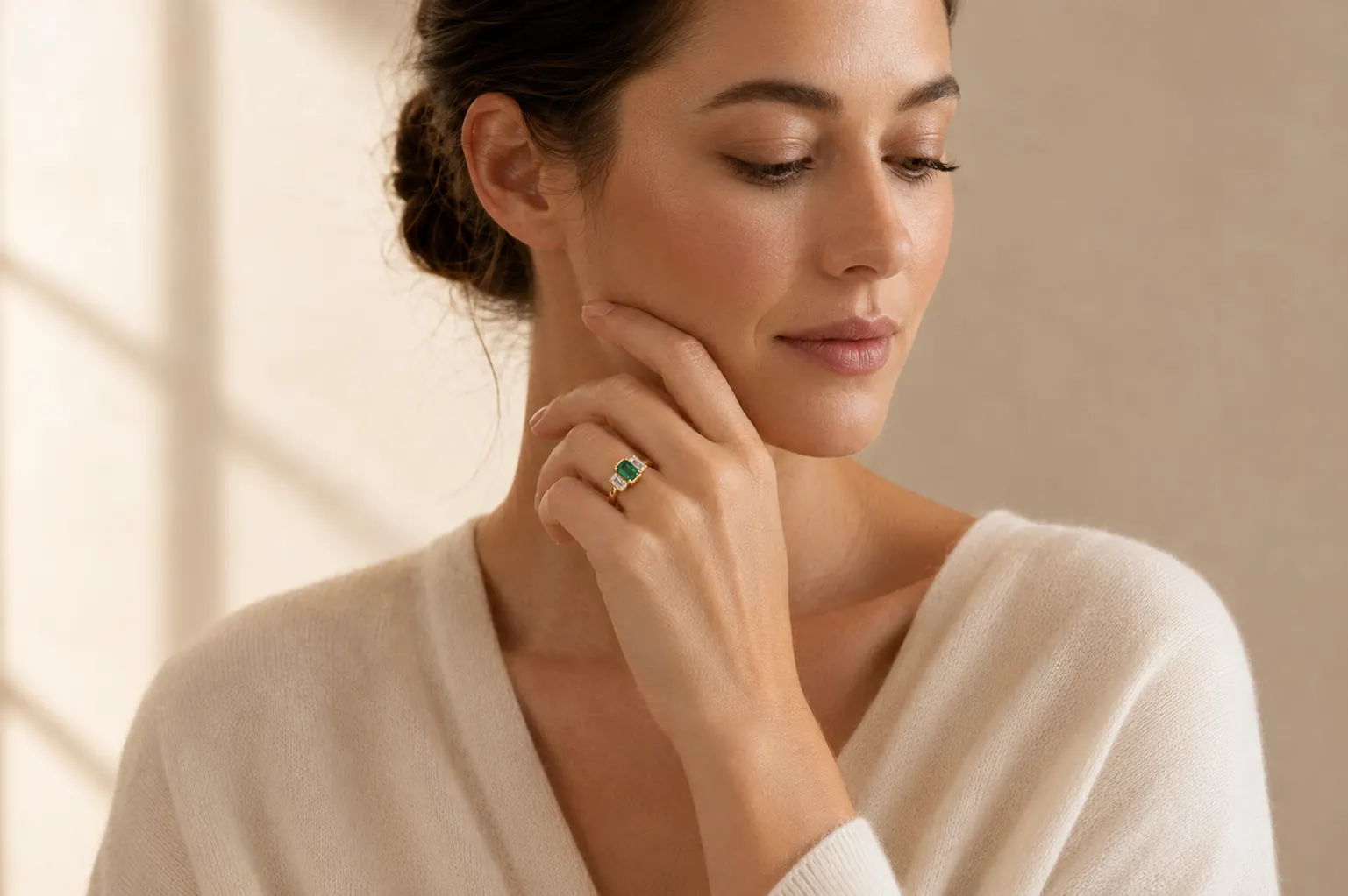 Emerald jewelry worn at ATL Luxury Jewelry showroom in Atlanta