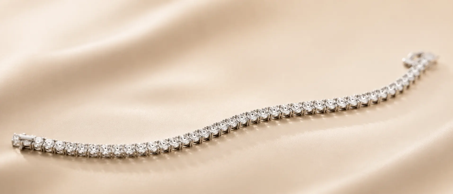 Diamond tennis bracelet on cream linen at ATL Luxury Jewelers Atlanta