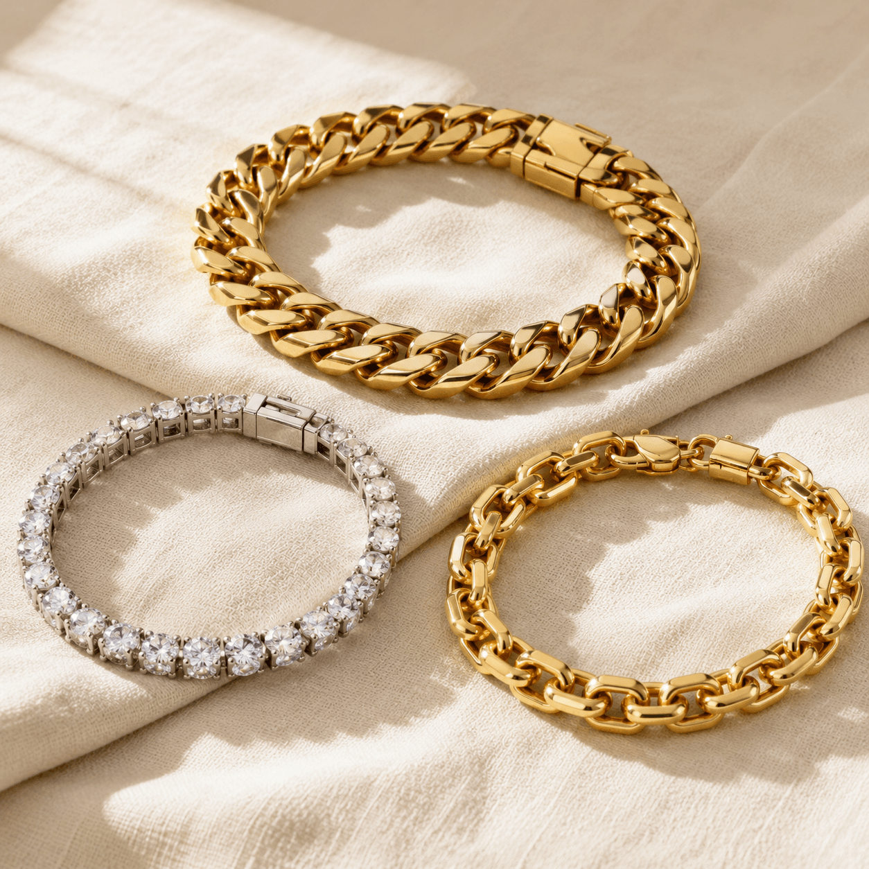 Mens gold Cuban link bracelet, mens diamond tennis bracelet, and mens chain link bracelet at ATL Luxury Jewelers Atlanta