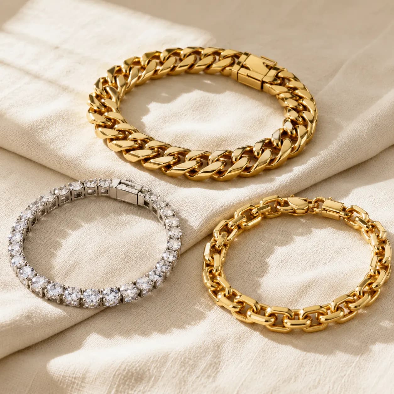 Mens gold Cuban link bracelet, mens diamond tennis bracelet, and mens chain link bracelet at ATL Luxury Jewelry Atlanta