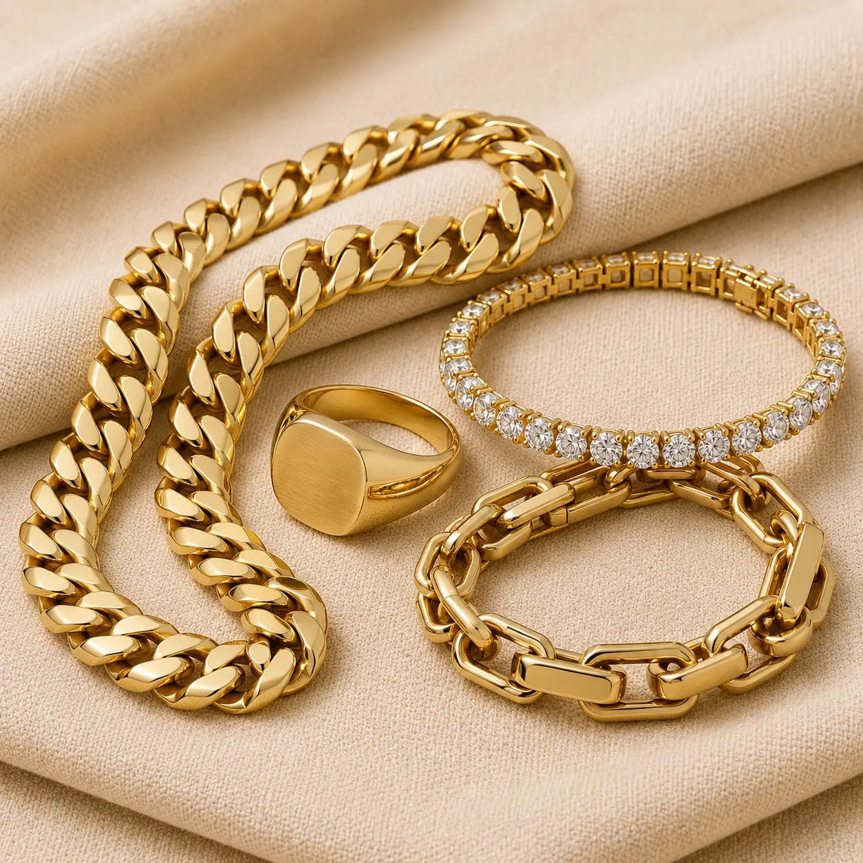 Men's fine jewelry collection — solid gold Cuban link chain, signet ring, men's diamond bracelet, and tennis bracelet at ATL Luxury Jewelry Atlanta