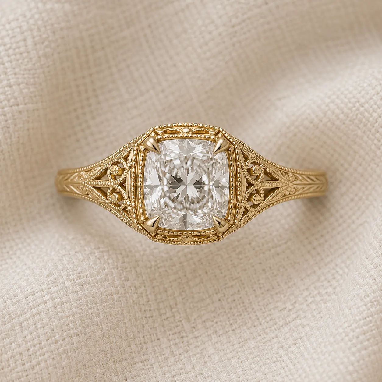 Antique-inspired cushion cut engagement ring with filigree and milgrain detailing