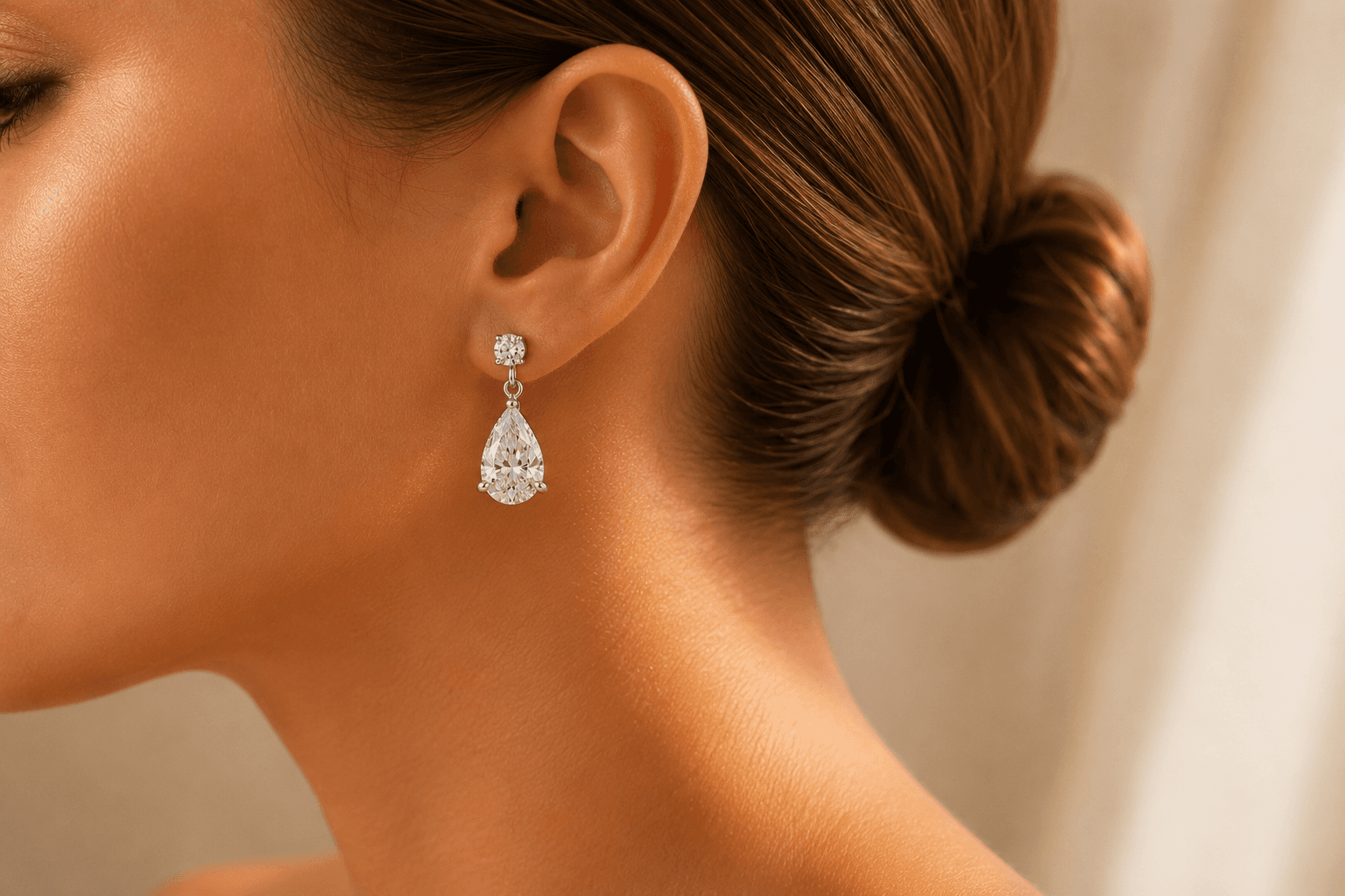 Diamond drop earring worn at ATL Luxury Jewelers showroom
