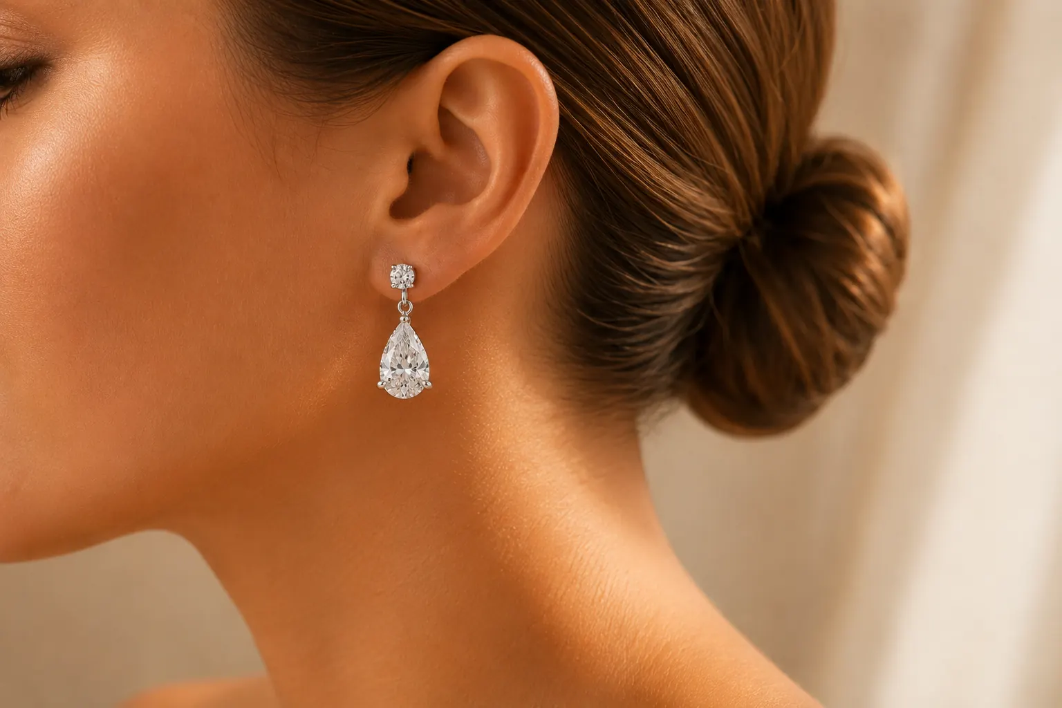 Diamond drop earring worn at ATL Luxury Jewelry showroom
