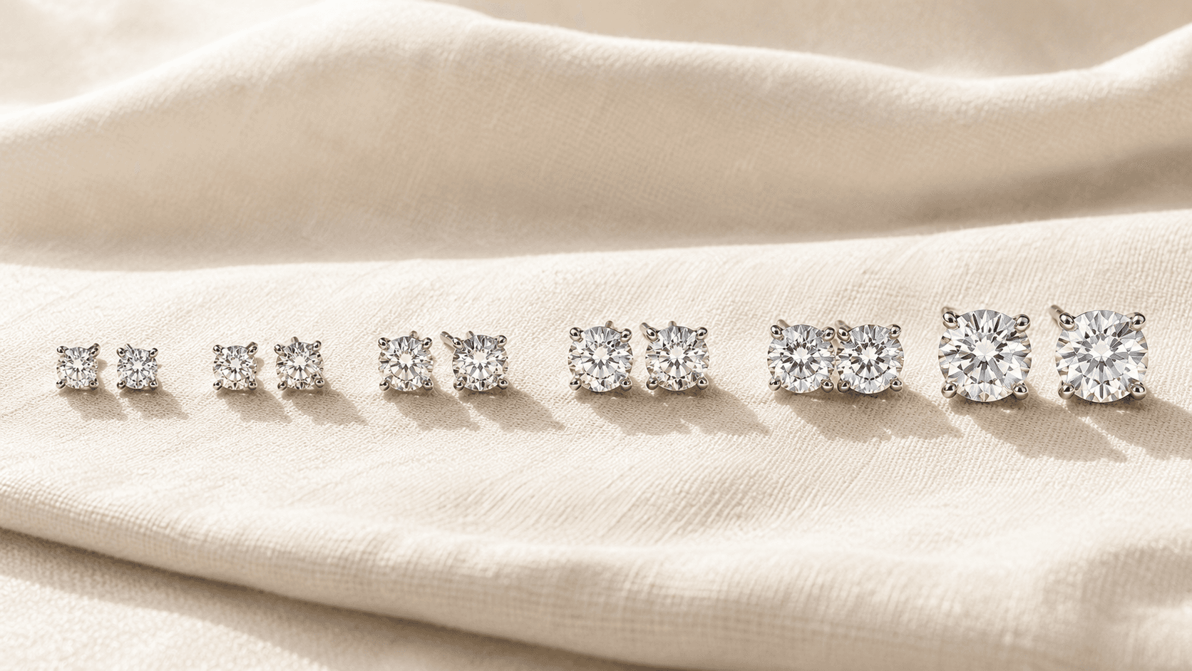 Diamond stud earrings in 0.25, 0.5, 1, 2, 3, and 4 carat total weight progression at ATL Luxury Jewelers Atlanta
