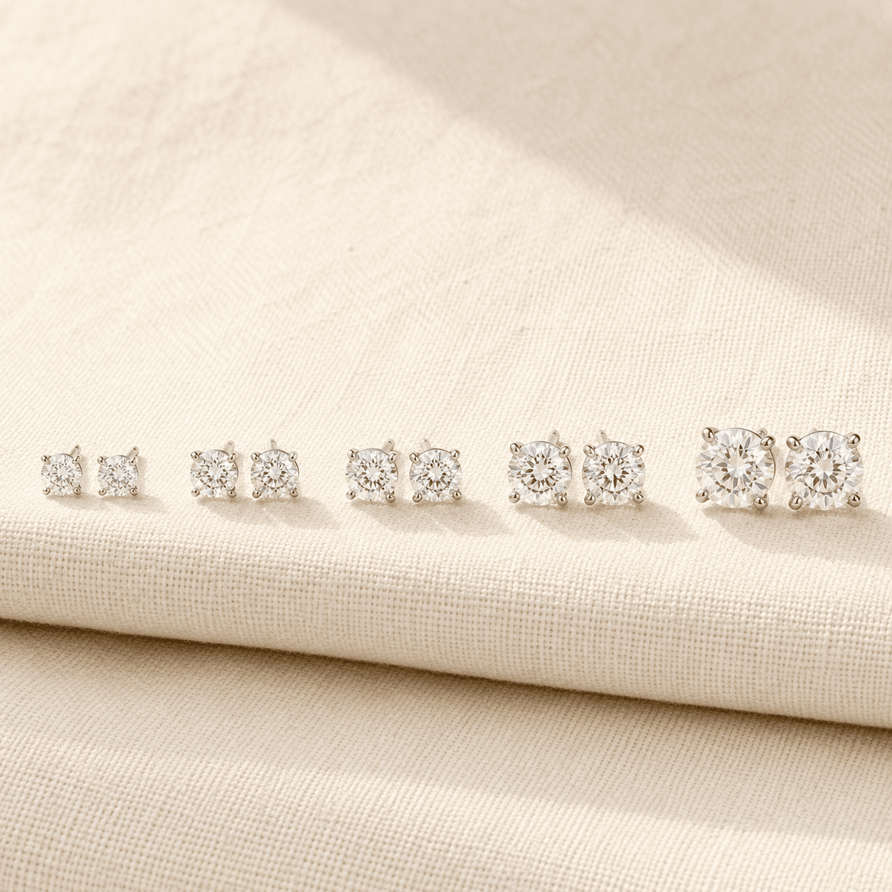 Diamond stud earrings in 0.5, 1, 2, 3, and 4 carat total weights at ATL Luxury Jewelers Atlanta