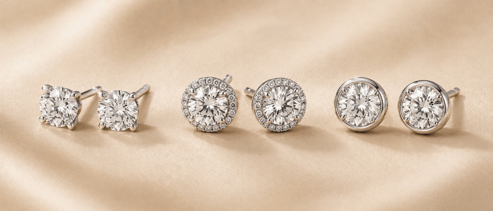 Diamond stud earrings on cream linen at ATL Luxury Jewelers Atlanta