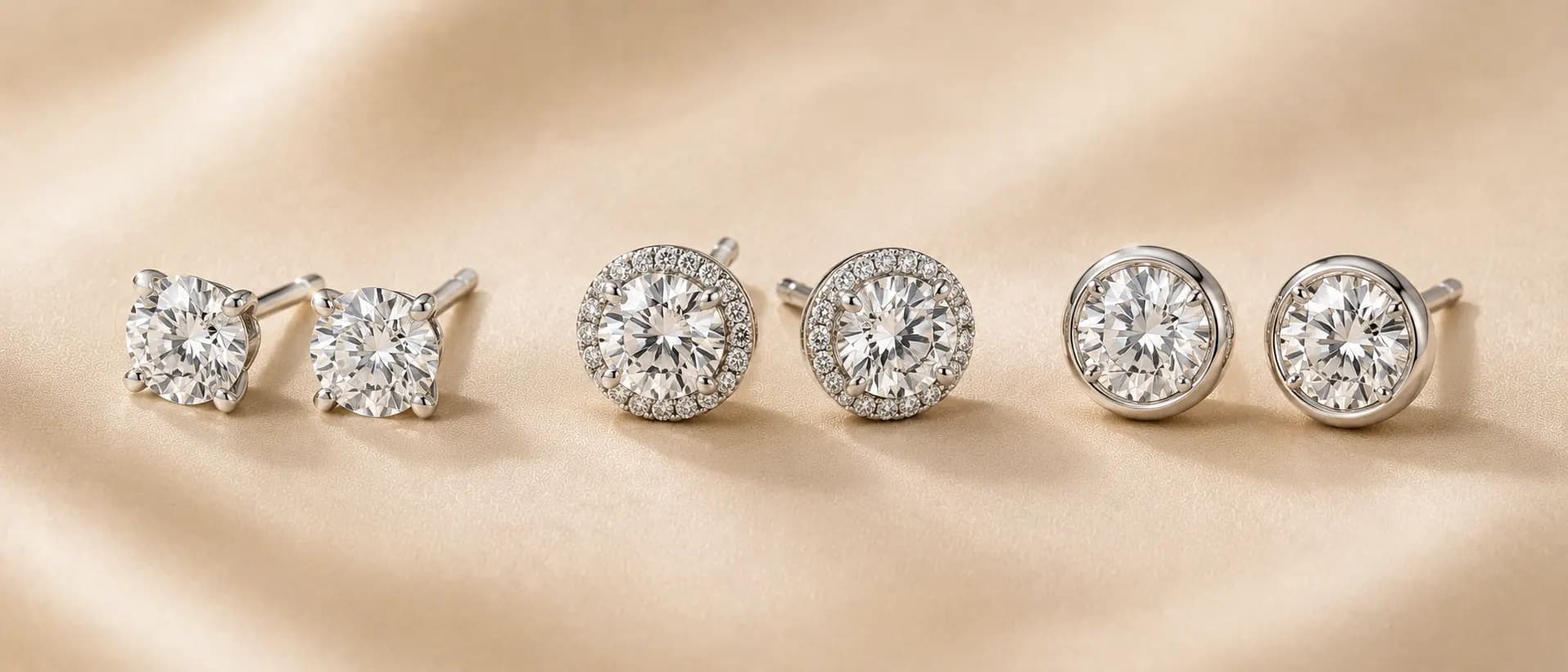Diamond stud earrings on cream linen at ATL Luxury Jewelry Atlanta