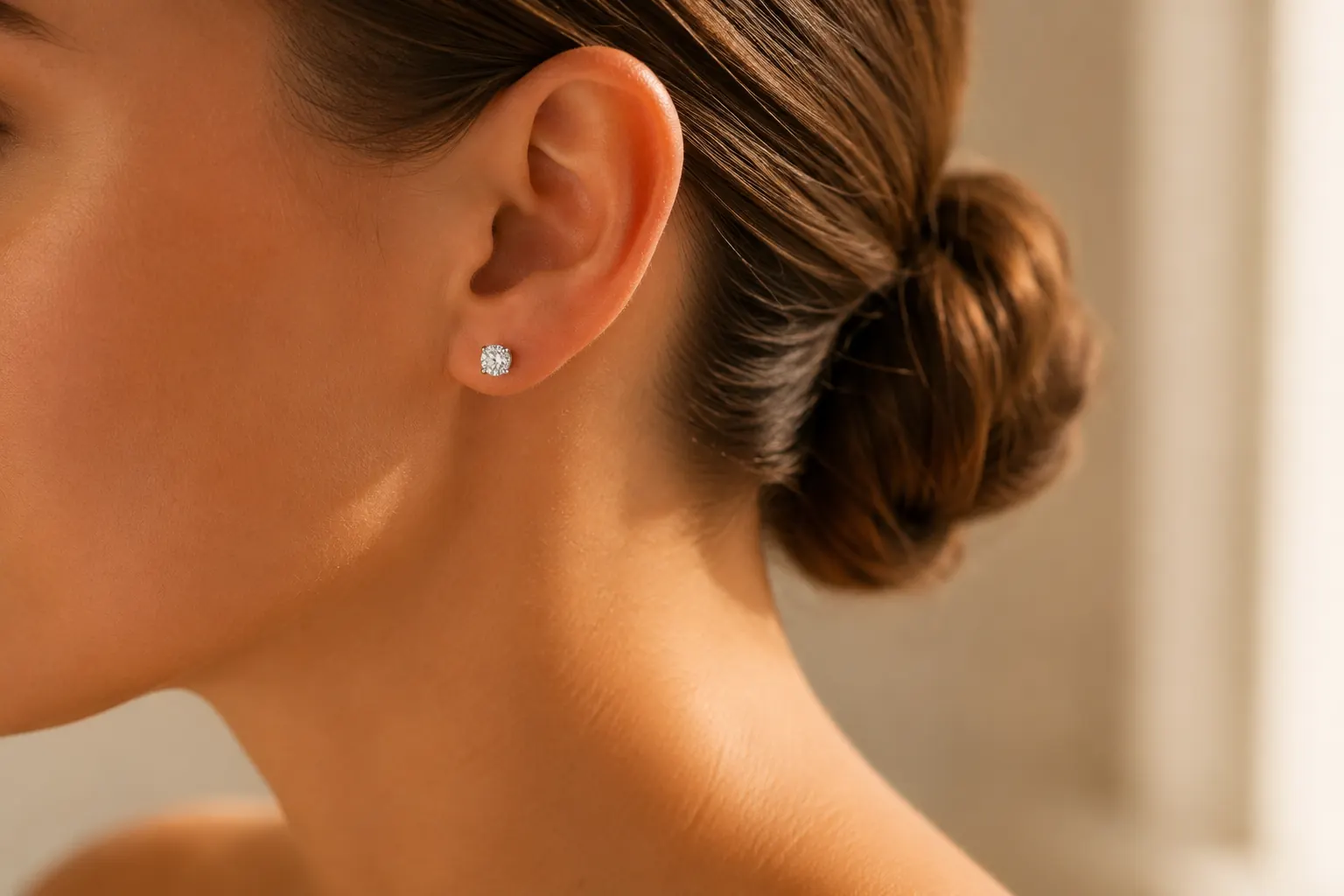 Diamond stud earring worn at ATL Luxury Jewelry showroom