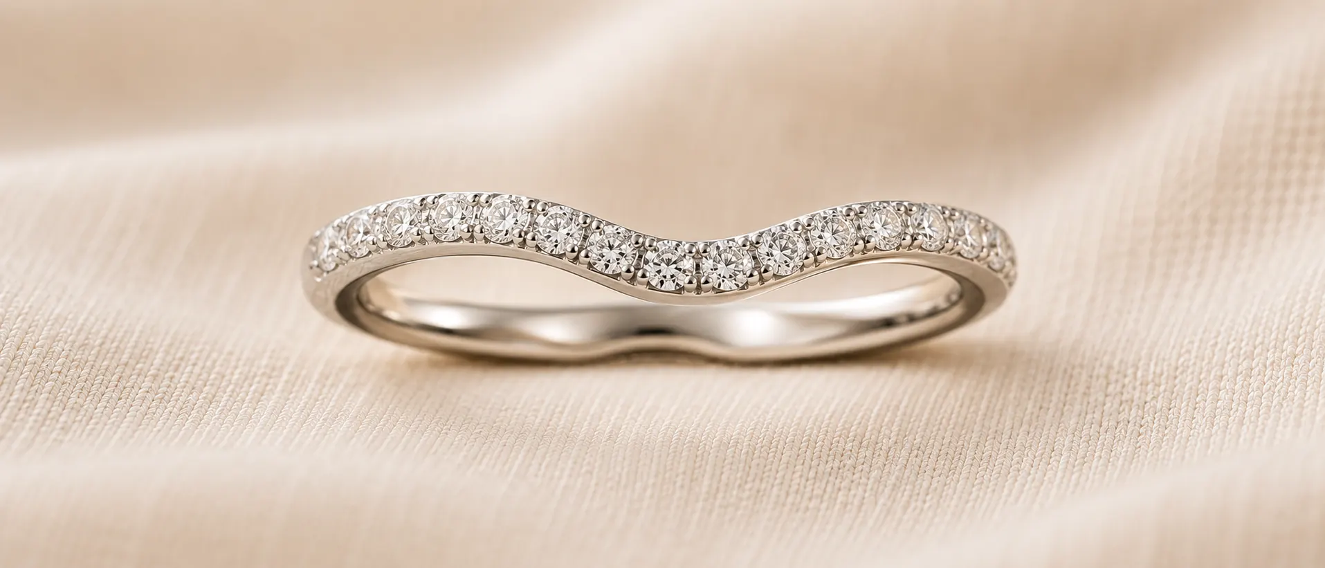 Curved diamond enhancer wedding band, handcrafted at ATL Luxury Jewelers in Atlanta