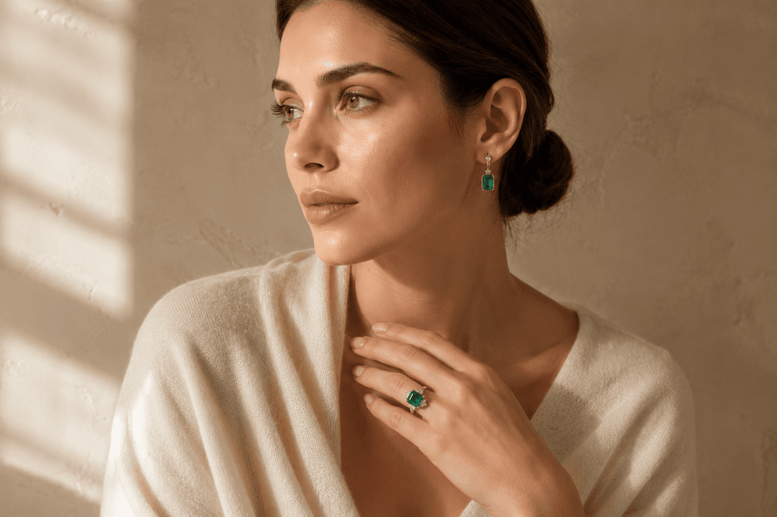 Emerald jewelry worn at ATL Luxury Jewelers Atlanta showroom