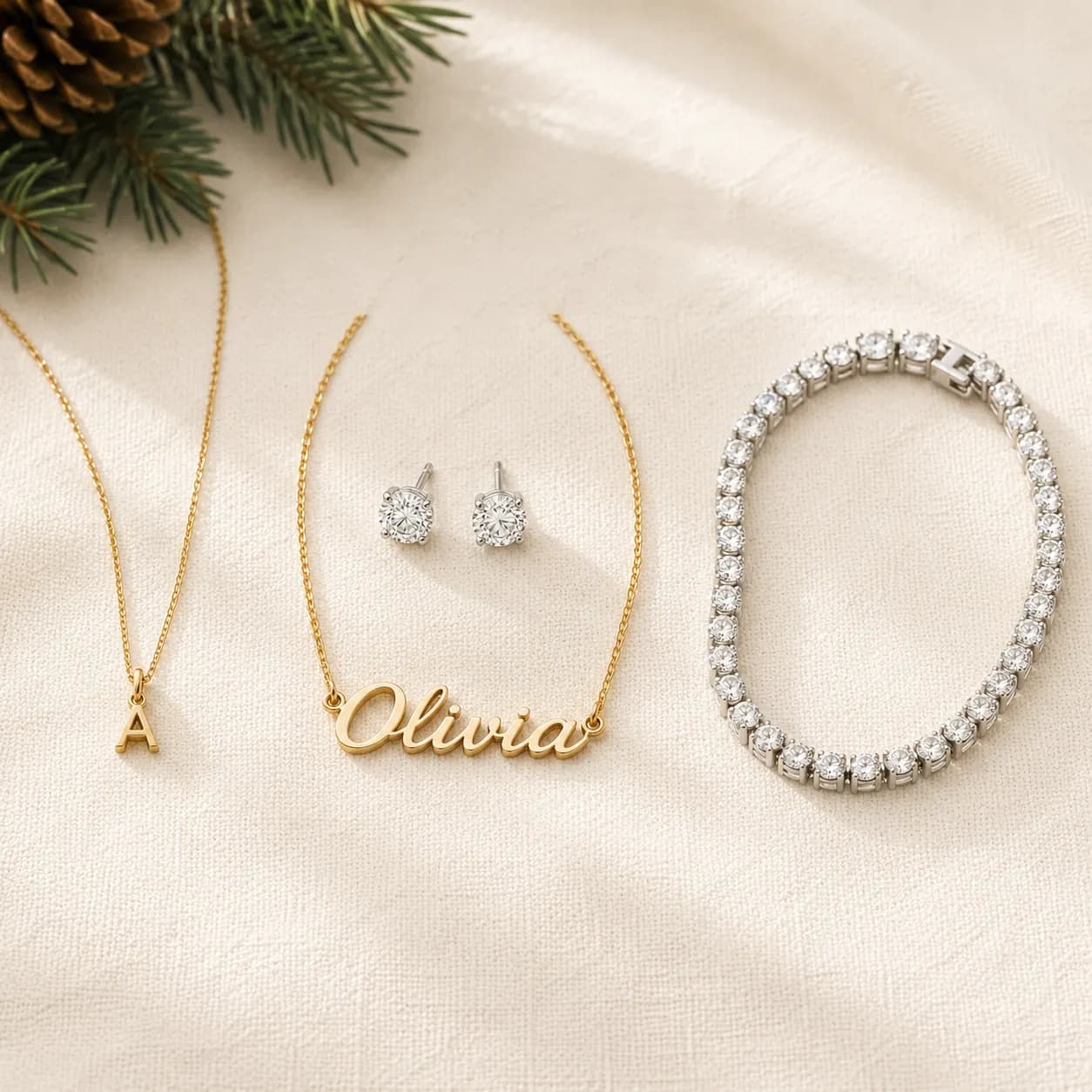 Christmas jewelry gifts across three tiers — stocking stuffer, mid-tier, and statement piece at ATL Luxury Jewelry