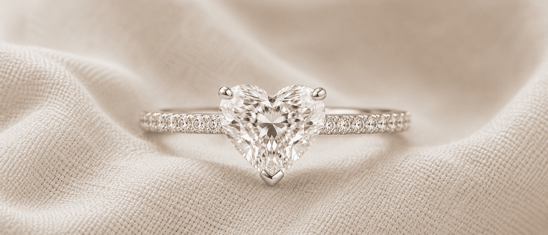 Heart shaped diamond engagement ring with pavé band, handcrafted at ATL Luxury Jewelers in Atlanta