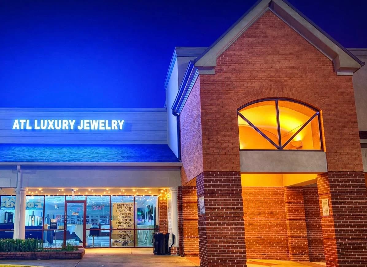 ATL Luxury Jewelers storefront at dusk on Scenic Highway in Snellville, GA
