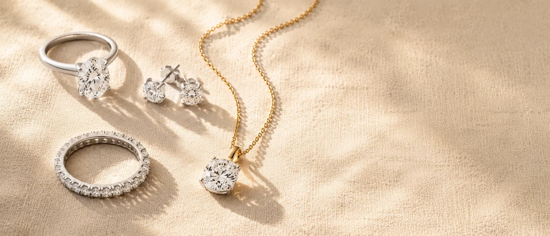 Lab-grown diamond jewelry on cream linen at ATL Luxury Jewelers Atlanta