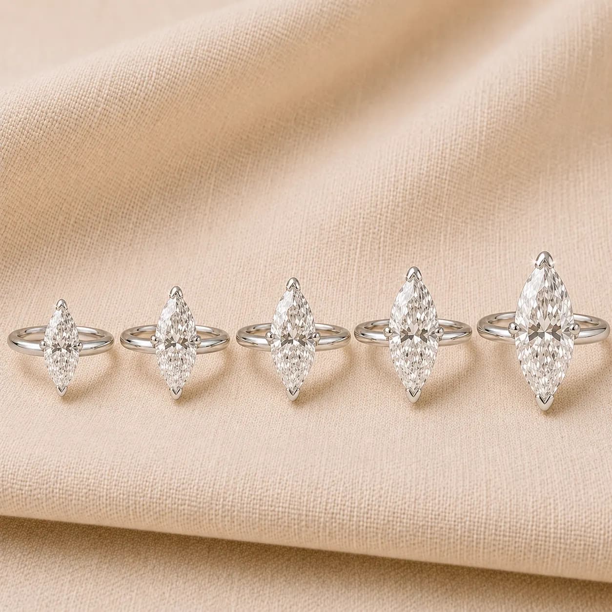 Marquise diamond engagement rings in 1, 2, 3, 4, and 5 carat sizes shown side-by-side at ATL Luxury Jewelry Atlanta