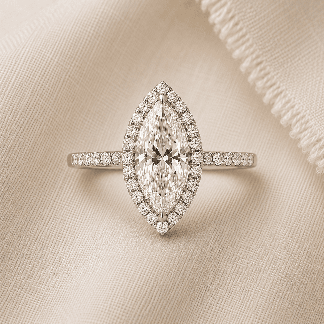 Marquise cut halo engagement ring