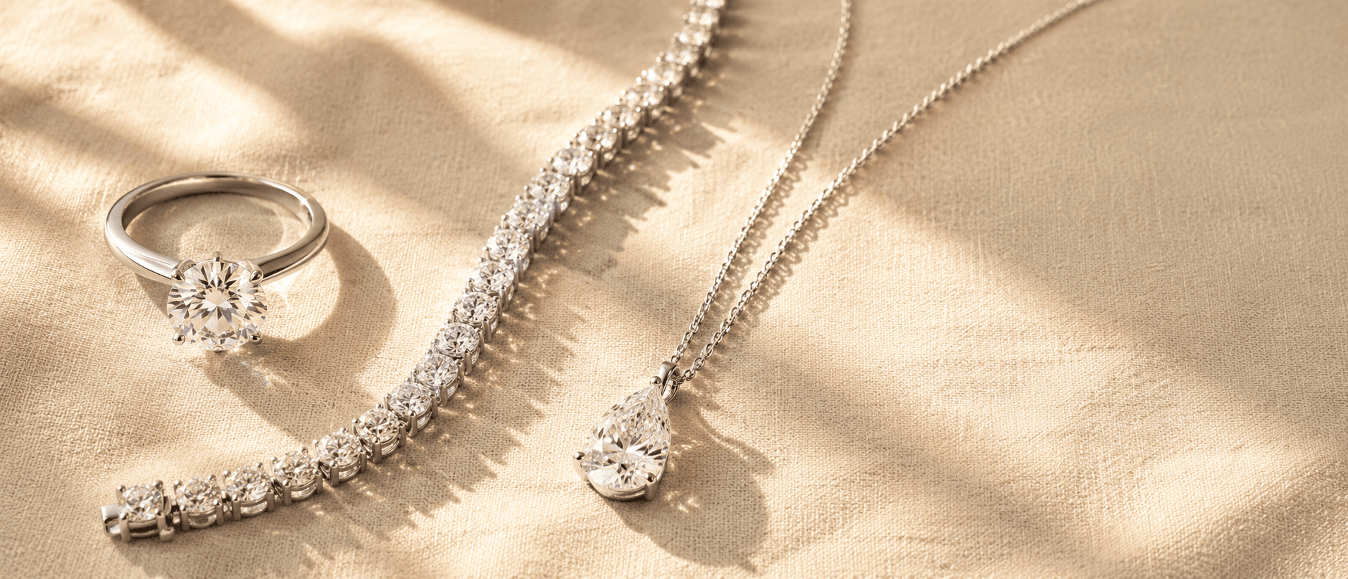 Natural diamond jewelry on cream linen at ATL Luxury Jewelers Atlanta