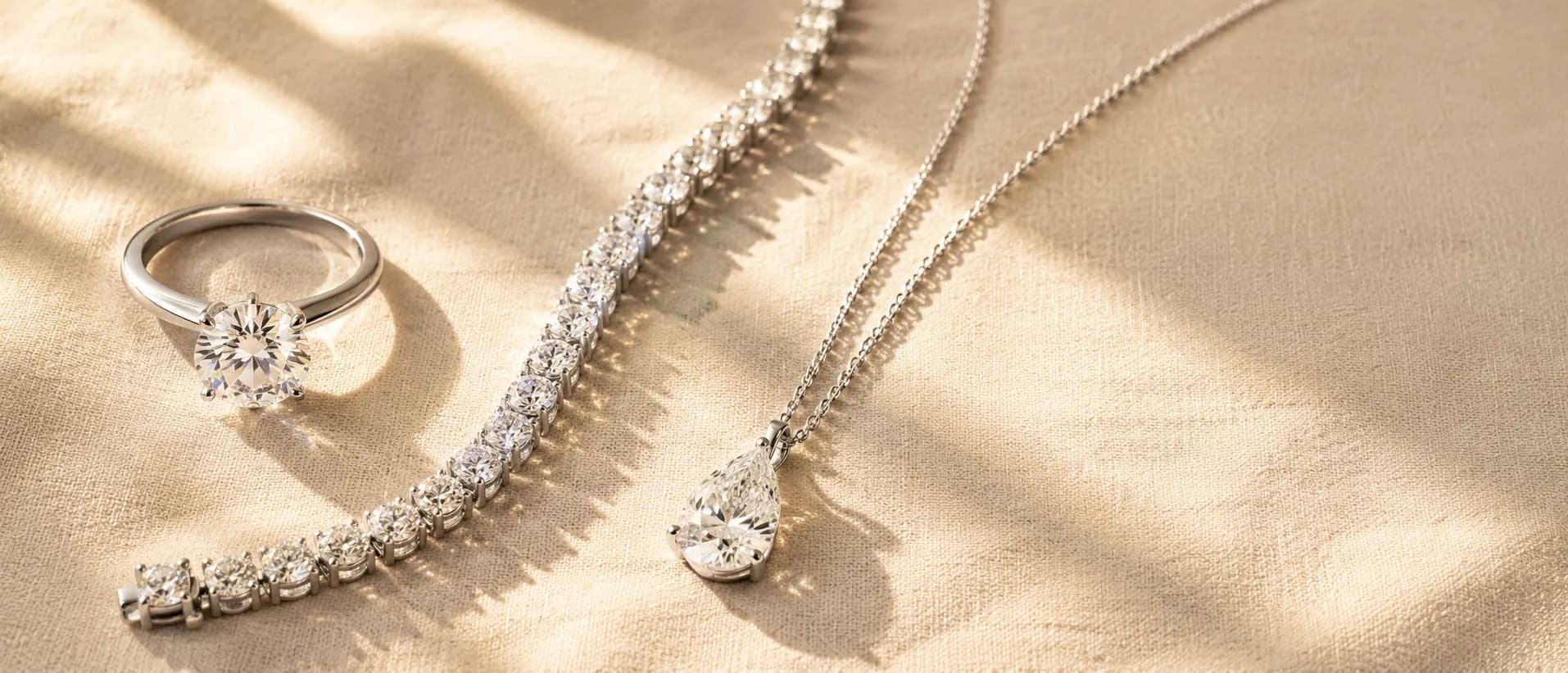 Natural diamond jewelry on cream linen at ATL Luxury Jewelry Atlanta