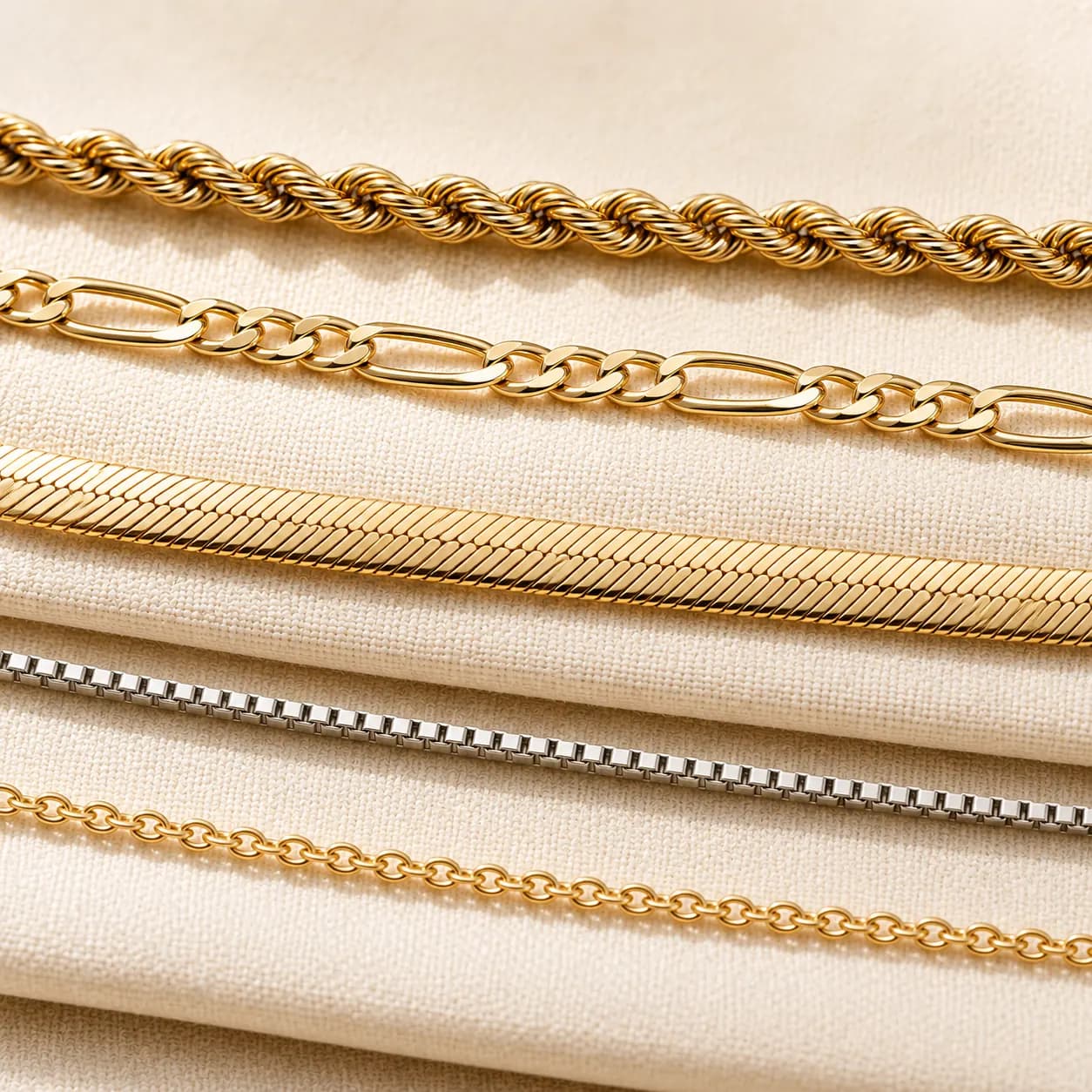 Gold rope chain, figaro chain, herringbone chain, box chain, and cable chain at ATL Luxury Jewelers Atlanta