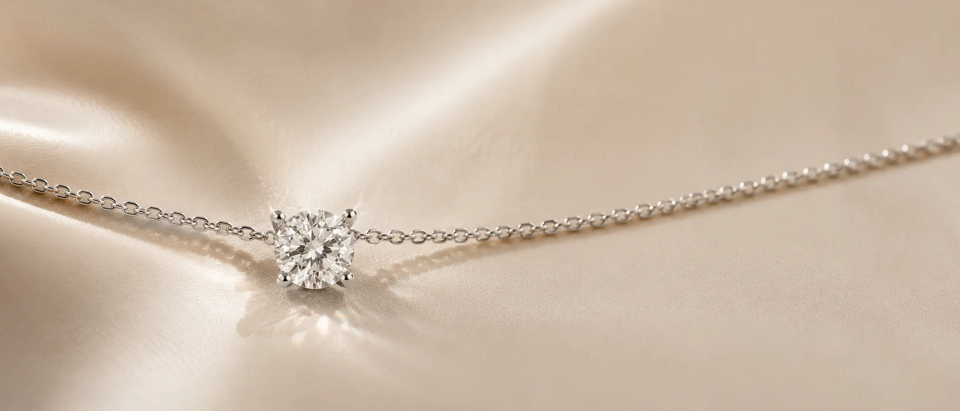 Diamond pendant necklace on cream linen at ATL Luxury Jewelry Atlanta