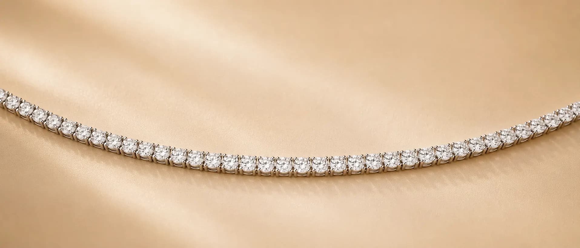 Diamond tennis necklace on cream linen at ATL Luxury Jewelry Atlanta