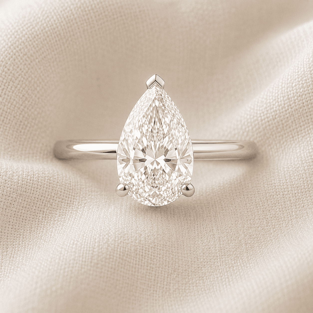 Pear cut diamond engagement ring