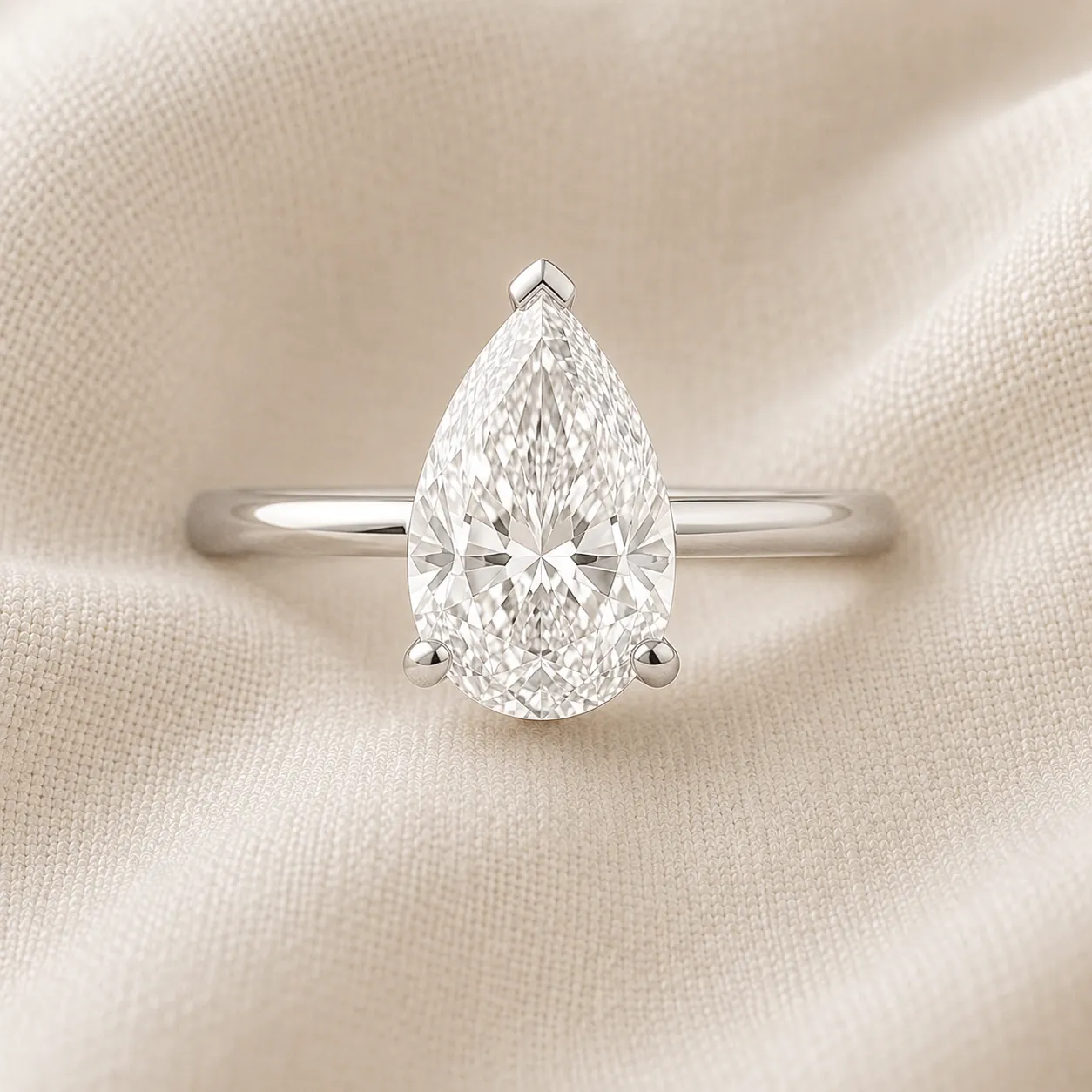 Pear cut diamond engagement ring
