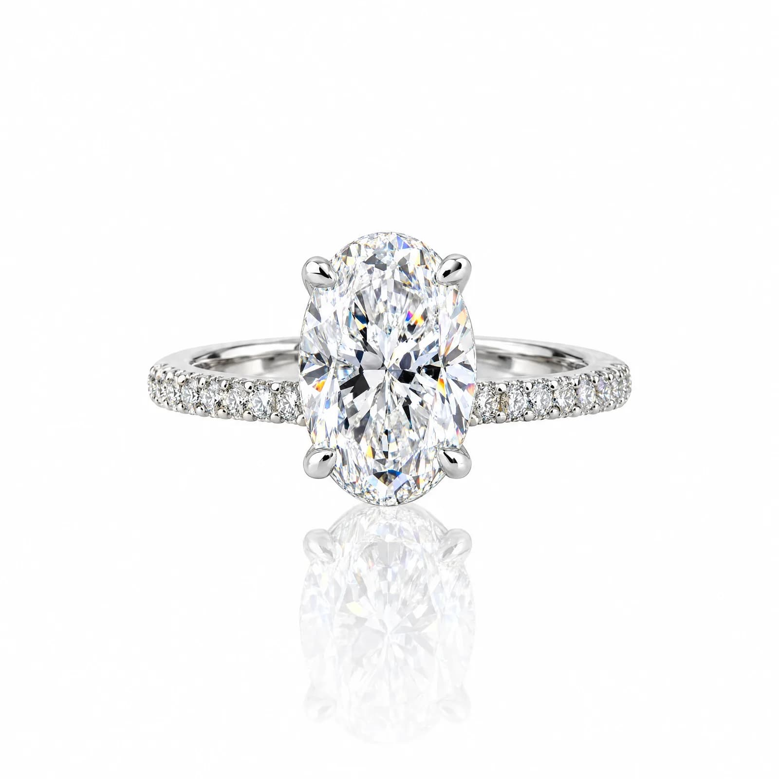 Design prototype — a rendering of an oval diamond solitaire engagement ring on a pavé diamond band ATL Luxury Jewelry can create for you