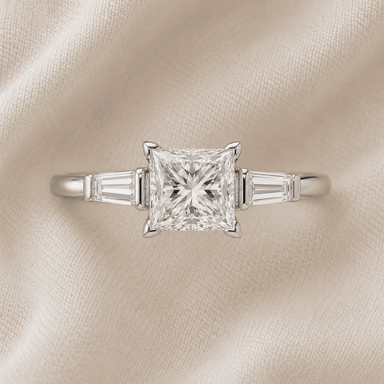 Princess cut three stone engagement ring