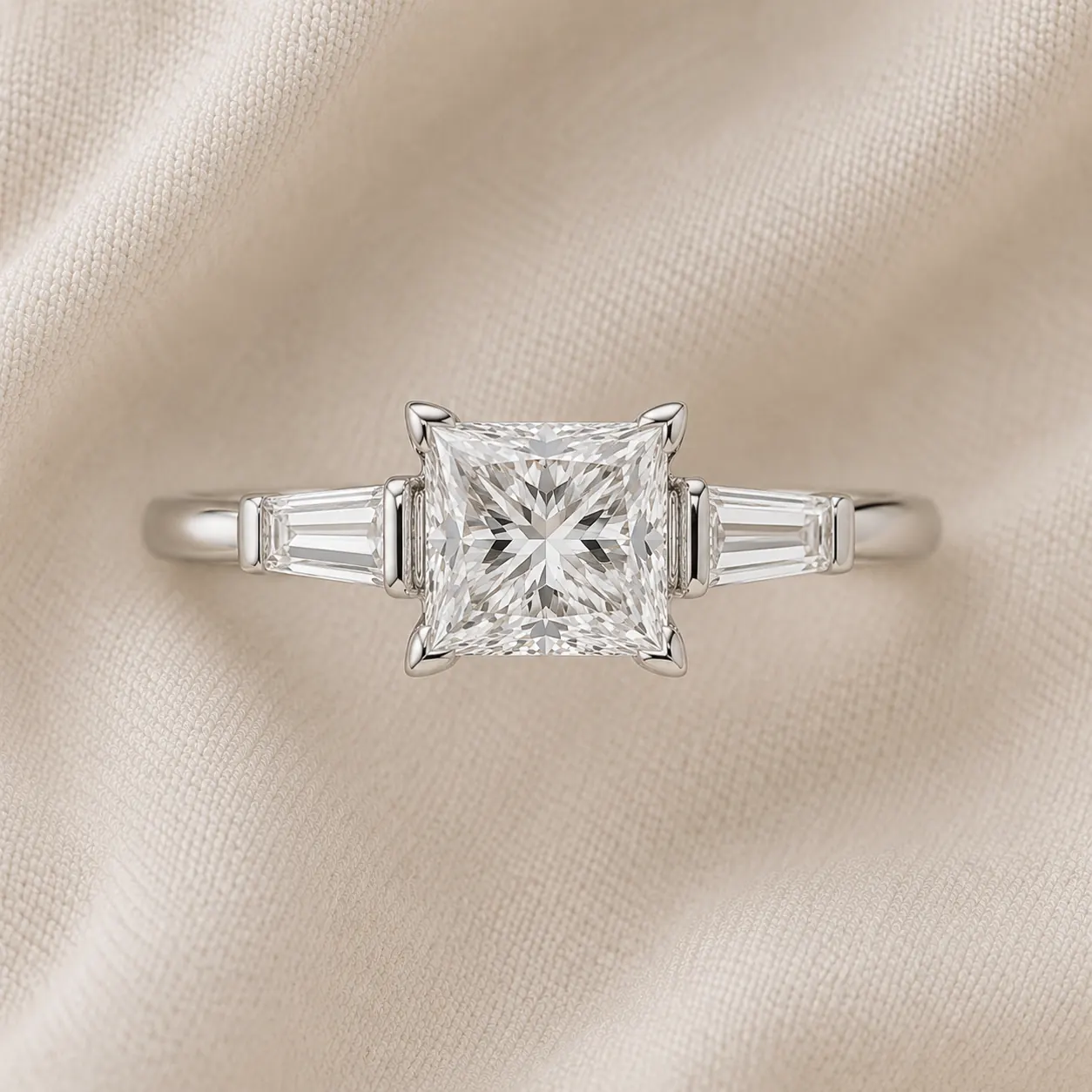 Princess cut three stone engagement ring