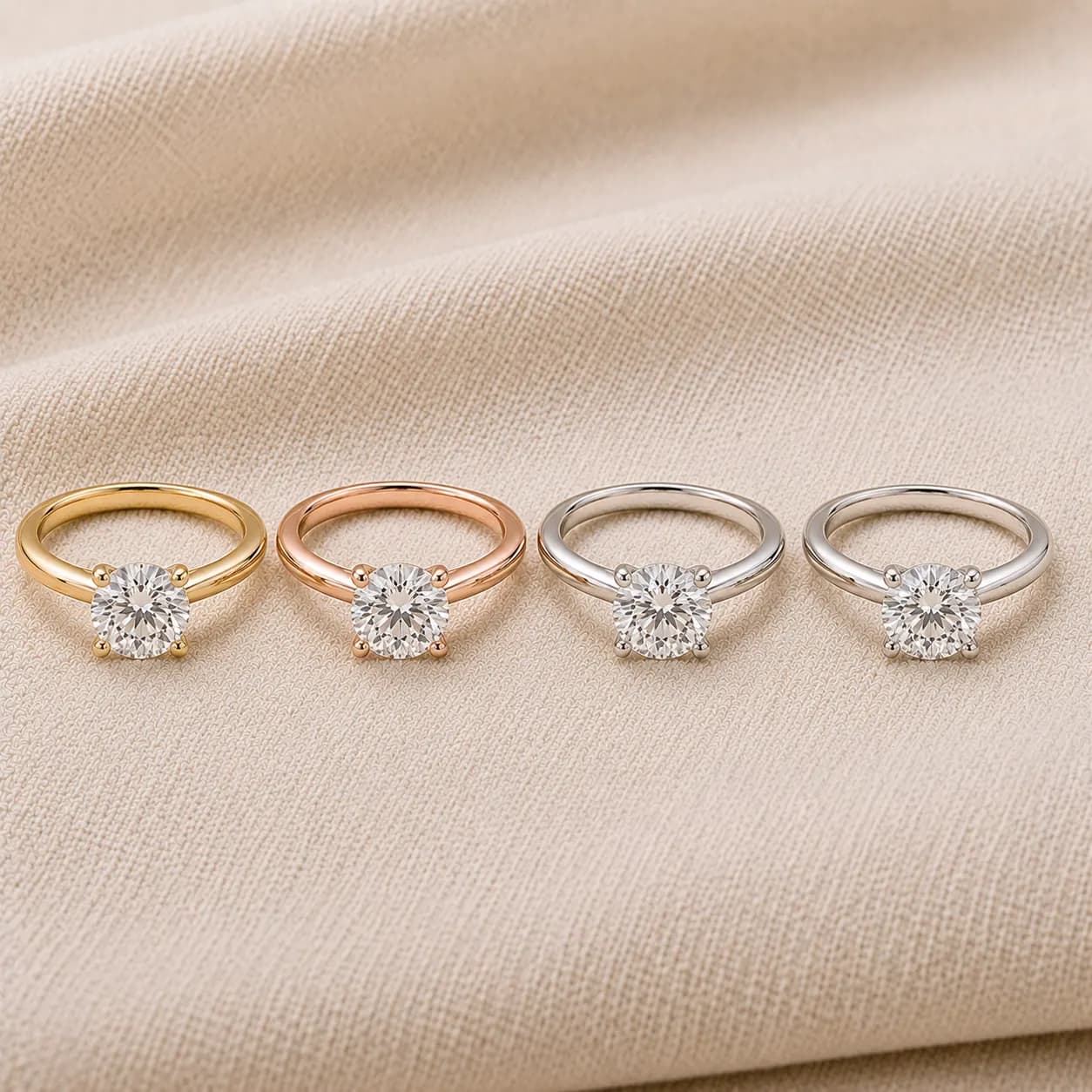 Round engagement rings in white gold, yellow gold, rose gold, and platinum at ATL Luxury Jewelers Atlanta