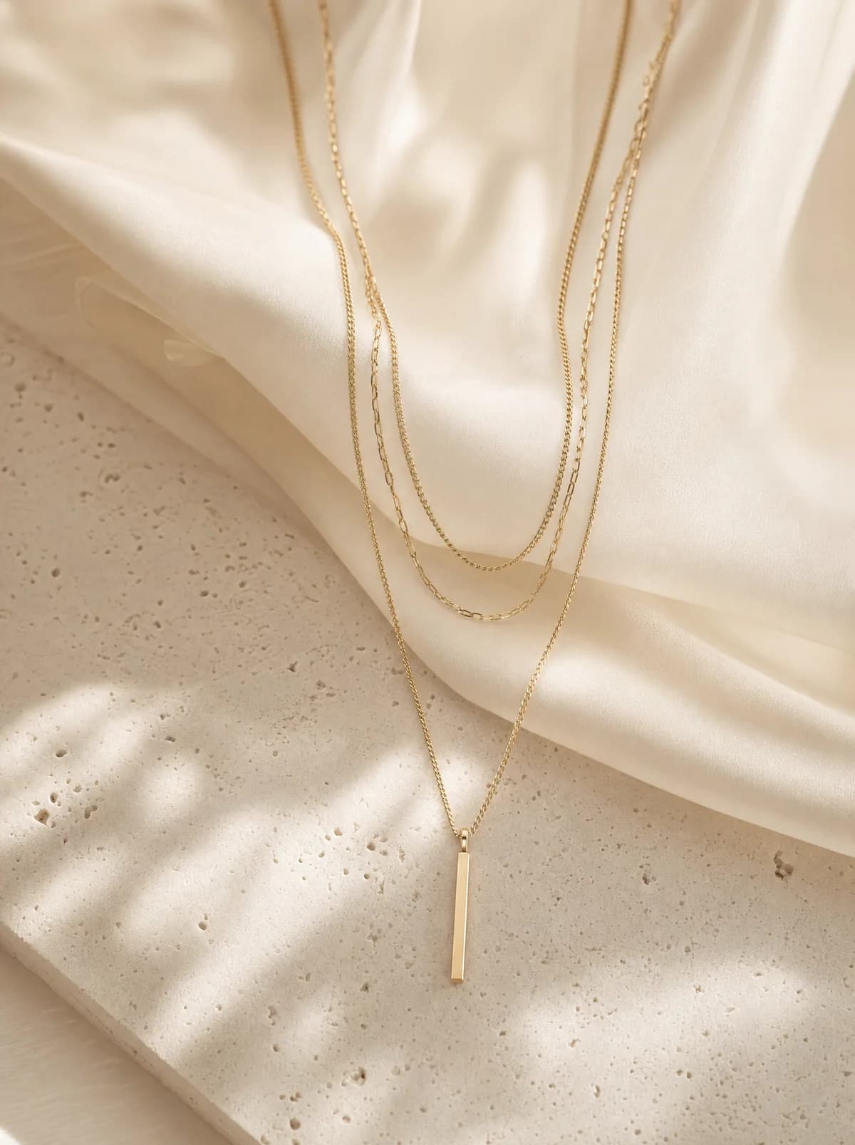 Layered gold chain necklaces