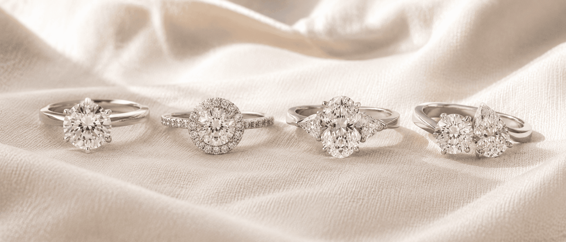 A range of engagement ring settings — solitaire, halo, three stone, and two stone — handcrafted at ATL Luxury Jewelers in Atlanta