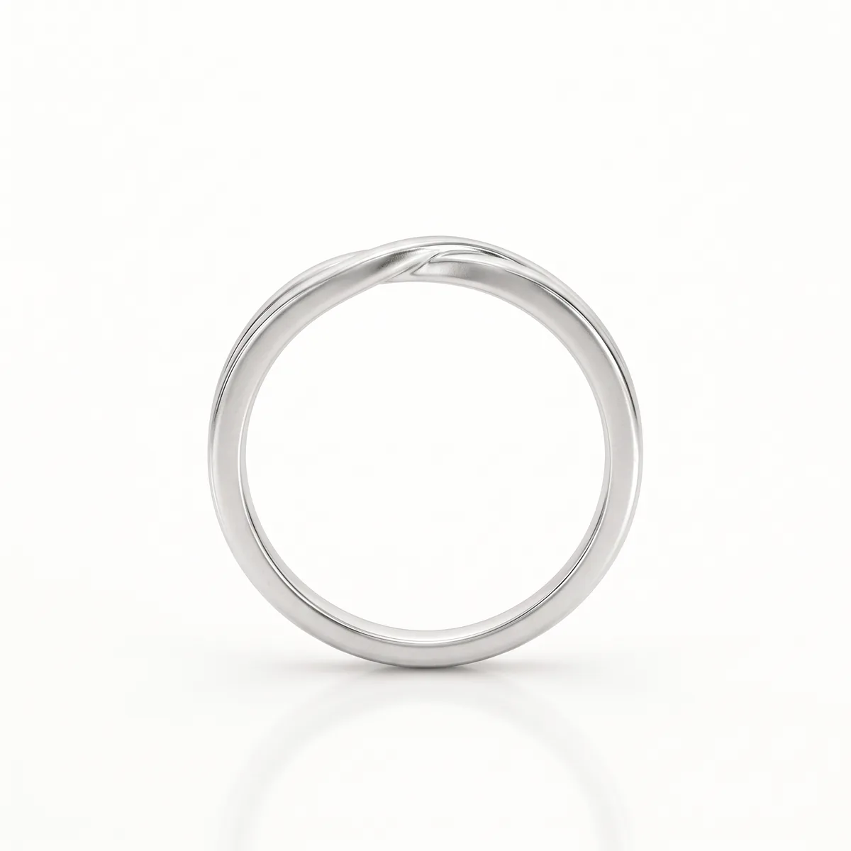 A platinum twist wedding band with a crossing, twisted design, seen face-on on a pale background