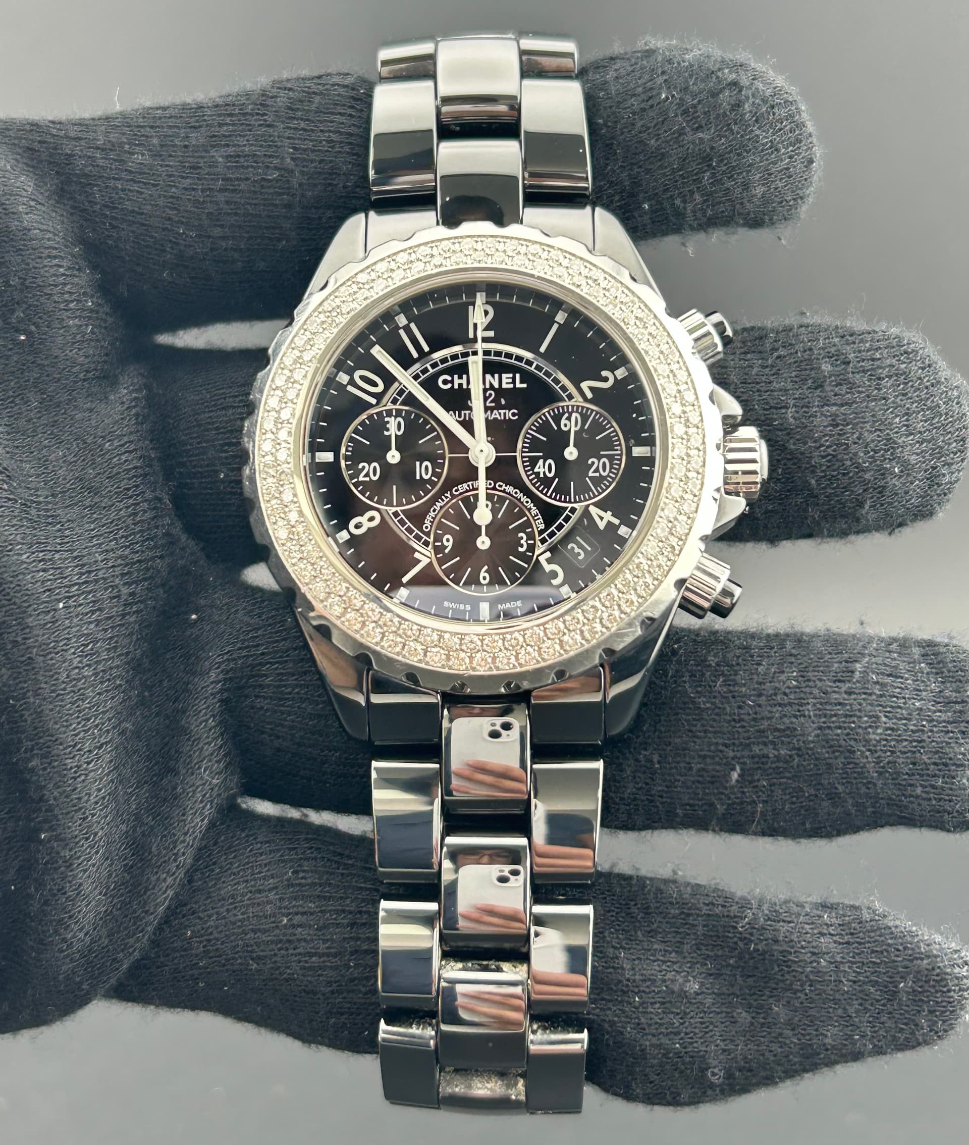 Chanel J12 Black Dial on Ceramic Ref. H1009 — 41mm case, Black dial, Ceramic bracelet. Very Good.