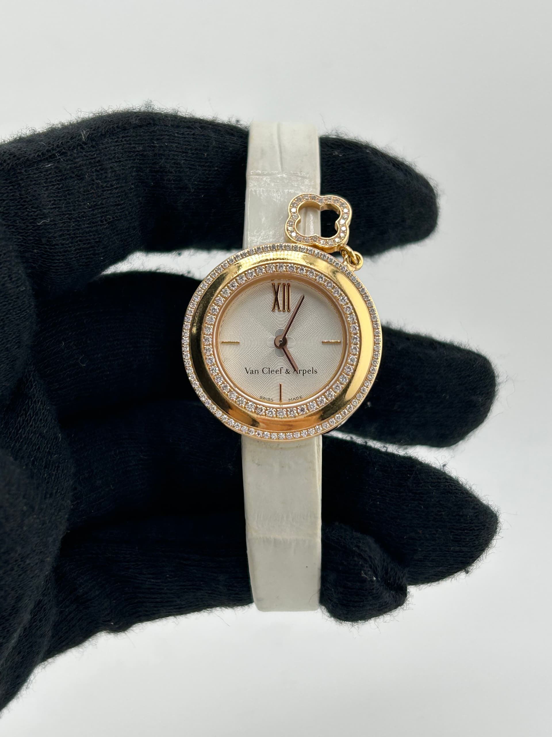 Van Cleef & Arpels Charms Mini Watch Silver Dial on Leather Ref. VCAR0298000 with Papers 2014 — 25.5mm case, Silver dial, Leather bracelet. Excellent, 2014. Complete Set.