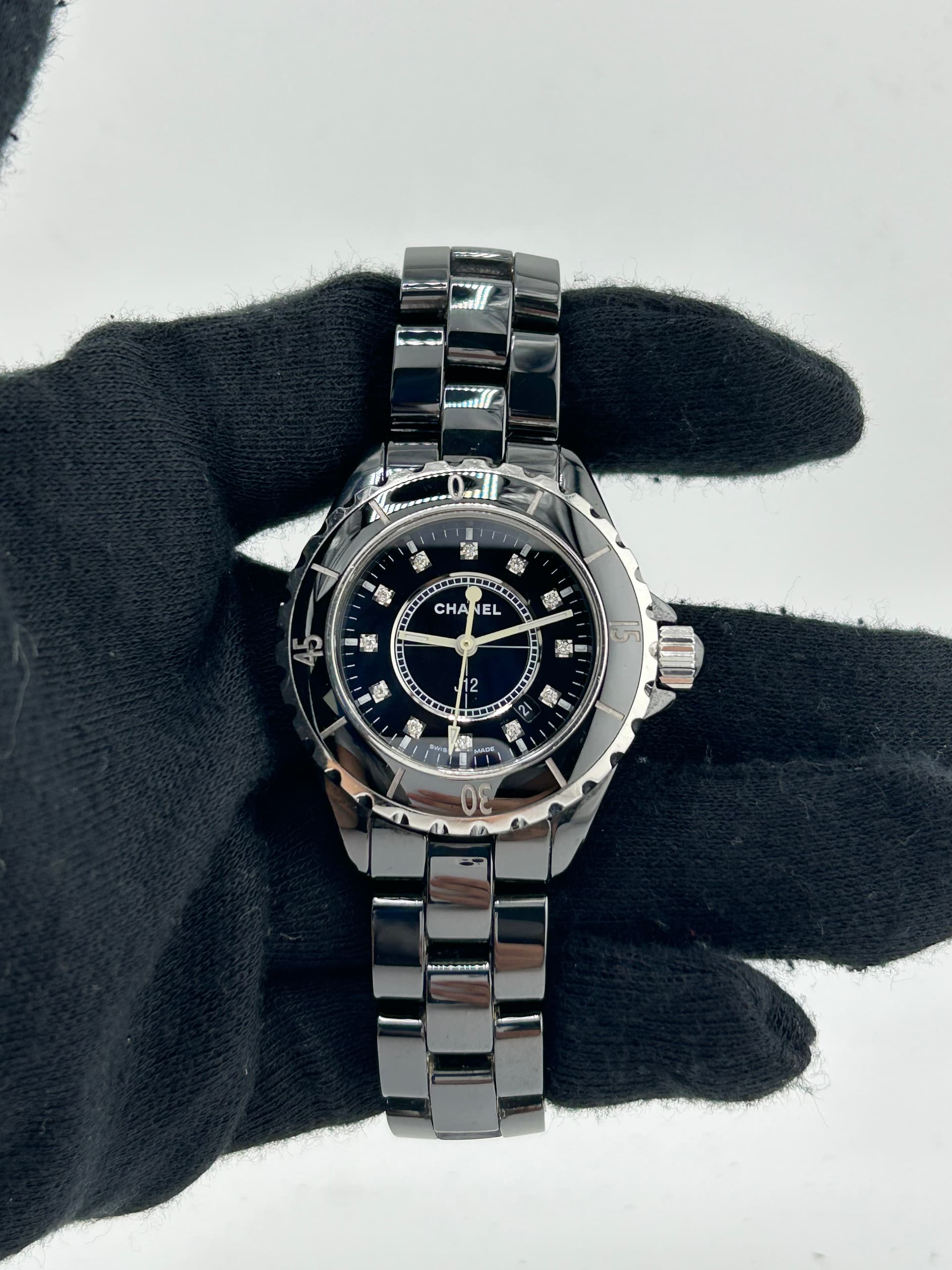 Chanel J12 Black With Factory Diamonds Dial on Bracelet Ref. H1625 with Card 2005 — 33mm Ceramic case, Black With Factory Diamonds dial, Bracelet bracelet. Very Good, 2005. OG box LA.