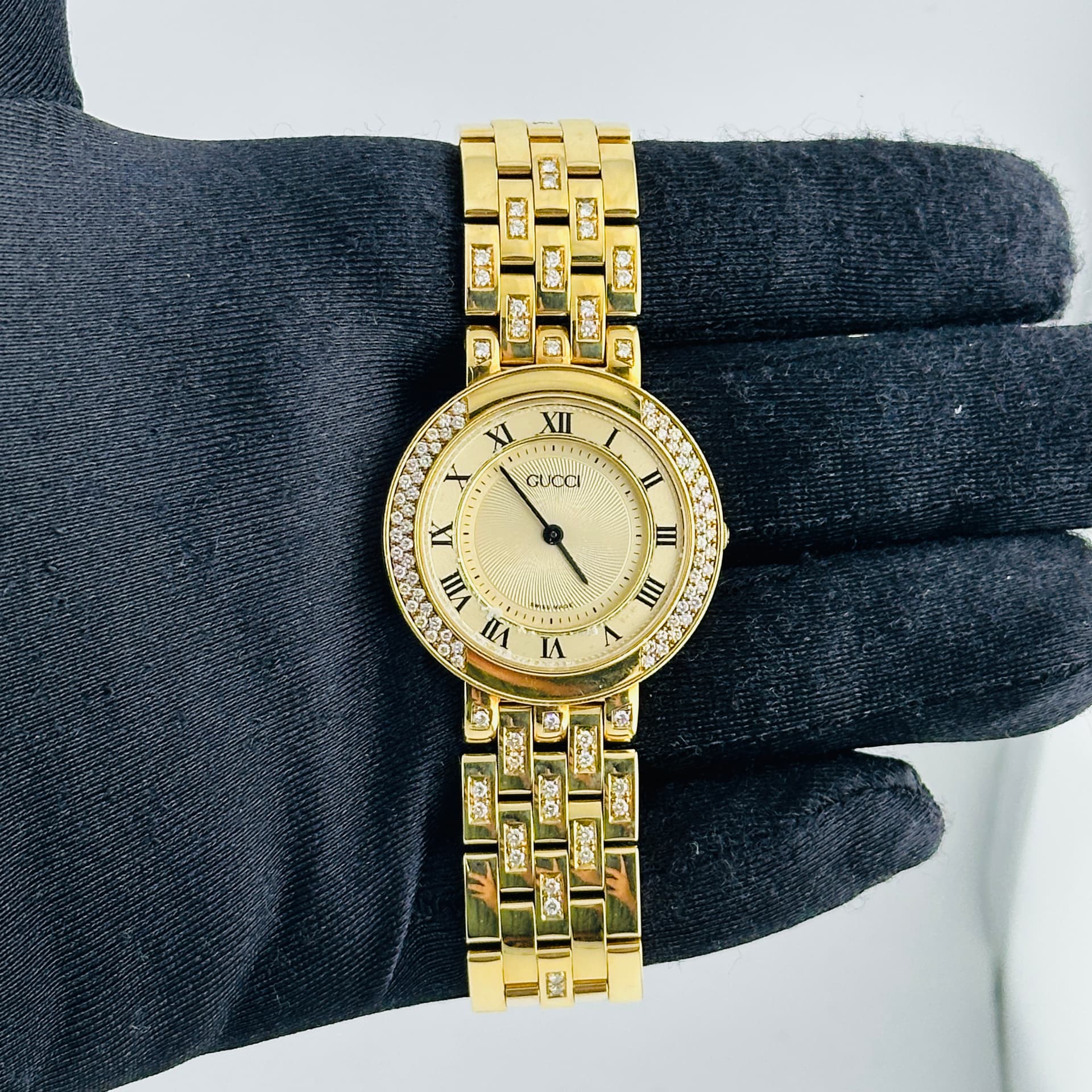 Gucci Gold (has spots) Dial Ref. 751M — 33mm Yellow Gold case, Gold (has Spots) dial, Unspecified bracelet. 102 Grams 18k Yellow Gold
FACTORY DIAMONDS.
