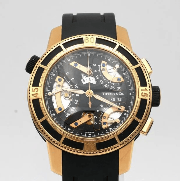 Tiffany & Co. Tri-Retrograde Black / Rose Dial on Leather Band Ref. T-57 — 44mm Rose Gold case, Black / Rose dial, Leather Band bracelet. Good.